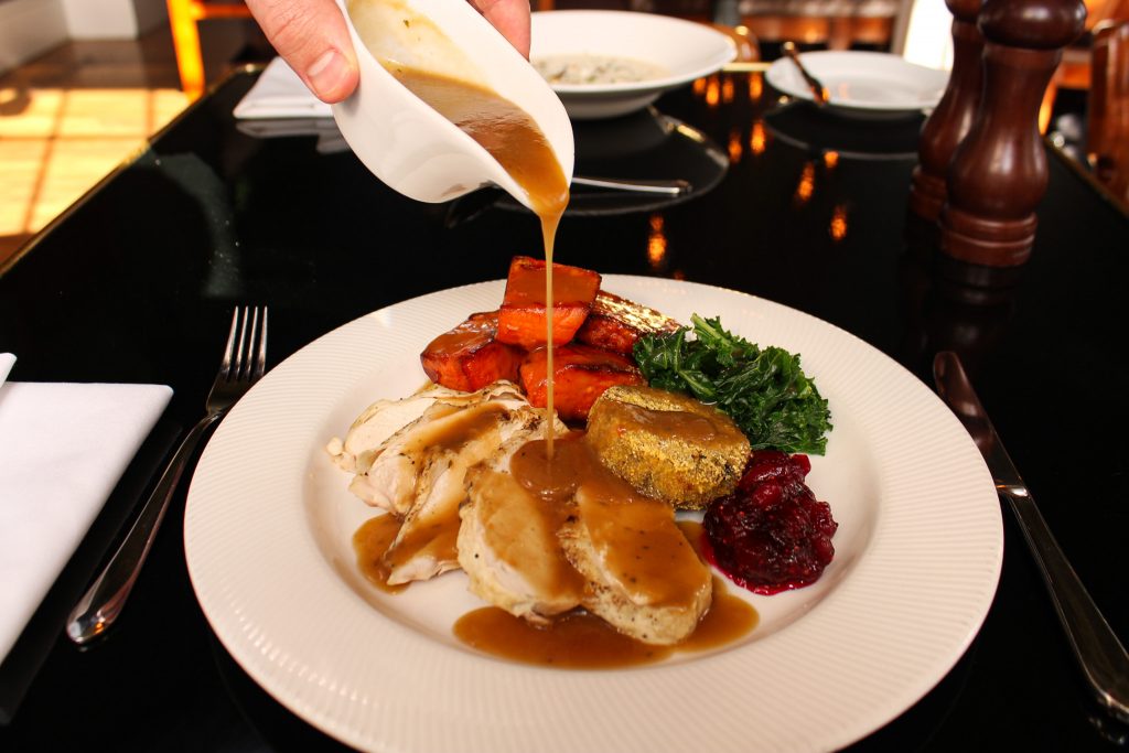 Thanksgiving Menu at RAILS Restaurant and Little Bar - gravy poured over turkey with trimmings